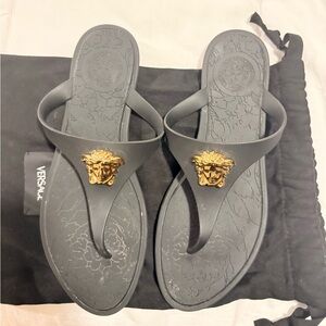 Versace Black Thong Sandals with Gold Medusa Accent
